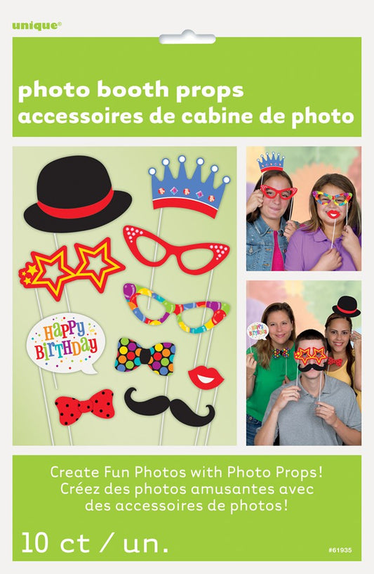 Colorful birthday photo booth props including a black top hat, gold star-shaped glasses, a blue crown, red cat-eye glasses,.