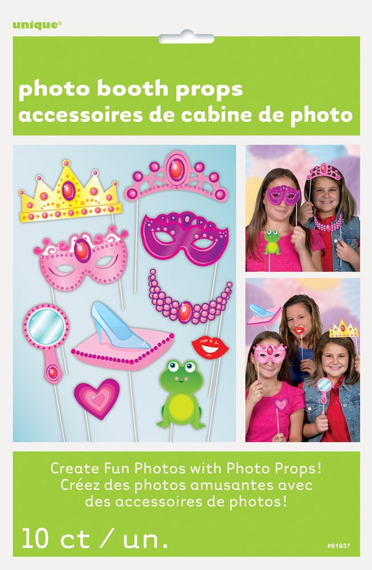 Colorful princess-themed photo booth props including a yellow crown, pink tiara, pink mask, pink heart, blue necklace, blue.
