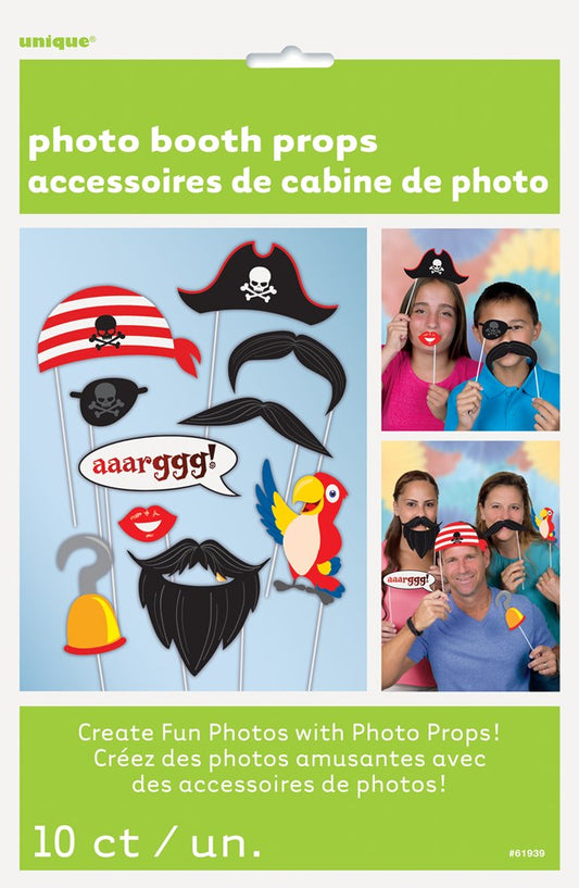 Colorful pirate-themed photo booth props including a striped hat, mustache, hook, eye patch, parrot, beard, and speech.