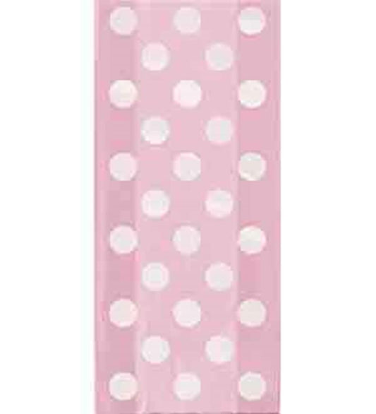 Pink cello bag with large white polka dots, rectangular shape, 5x11 inches.