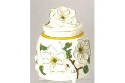 White ceramic jar with gold trim and raised white flower decorations, topped with a floral lid.