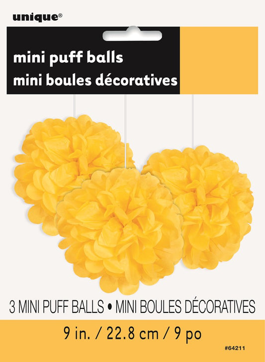 Three bright yellow tissue mini puff balls, 9 inches in diameter, with fluffy layered petals.