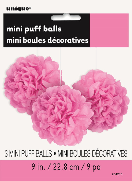 Set of three hot pink tissue paper mini puff balls, 9 inches diameter, fluffy decorative spheres.
