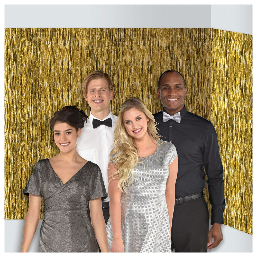 Gold metallic fringe curtain backdrop with a shiny, textured finish for event decoration.