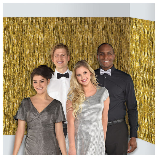Gold metallic fringe curtain backdrop with a shiny, textured finish for event decoration.