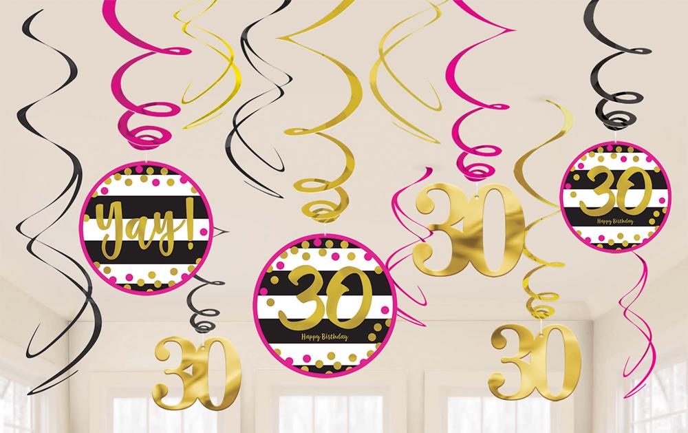 Pink, gold, and black spiral streamers with round "30" and "Yay!" hanging decorations and gold "30" number balloons.