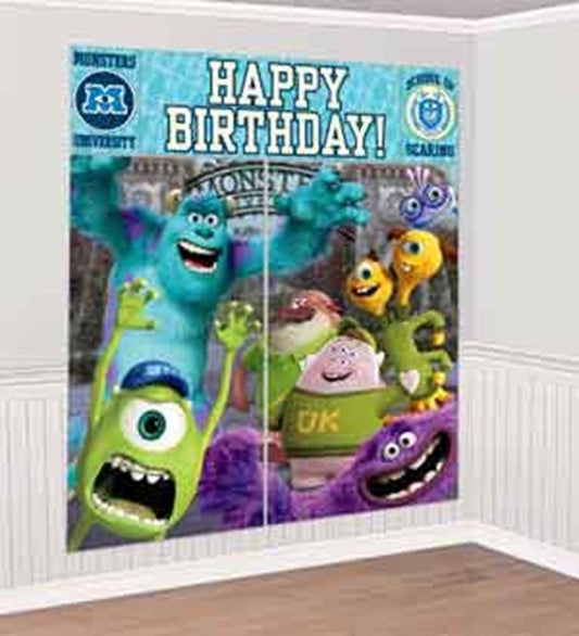 Monsters University themed birthday scene setter with colorful characters and blue "Happy Birthday!" text on white.