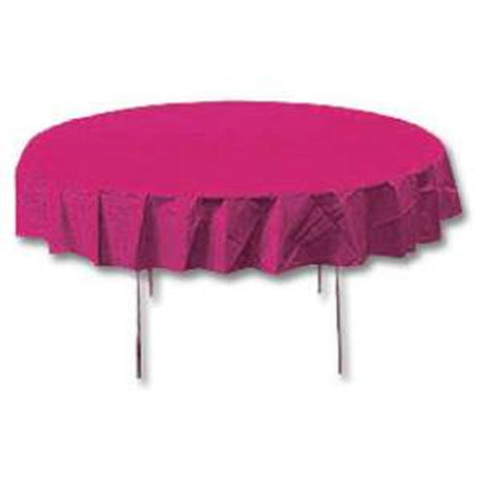 Round hot magenta tablecover with ruffled edges on a metal table.