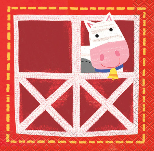Square red paper napkin with a white barn design and a cartoon cow peeking out from a window.
