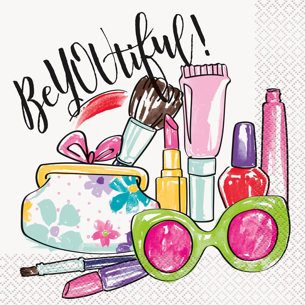 Colorful spa-themed napkin with green sunglasses, makeup brush, lipstick, nail polish, and "BeYOUtiful!" text.