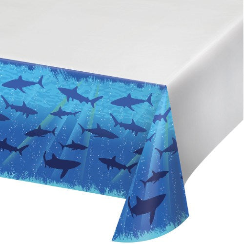 Blue rectangular tablecover with dark blue shark silhouettes and underwater bubble patterns.