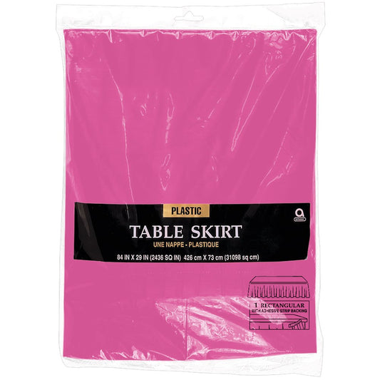 Bright pink plastic table skirt 29in by 14ft in clear packaging with black label.