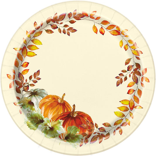 Round cream-colored paper plate with watercolor orange pumpkins and a wreath of autumn leaves around the edge.