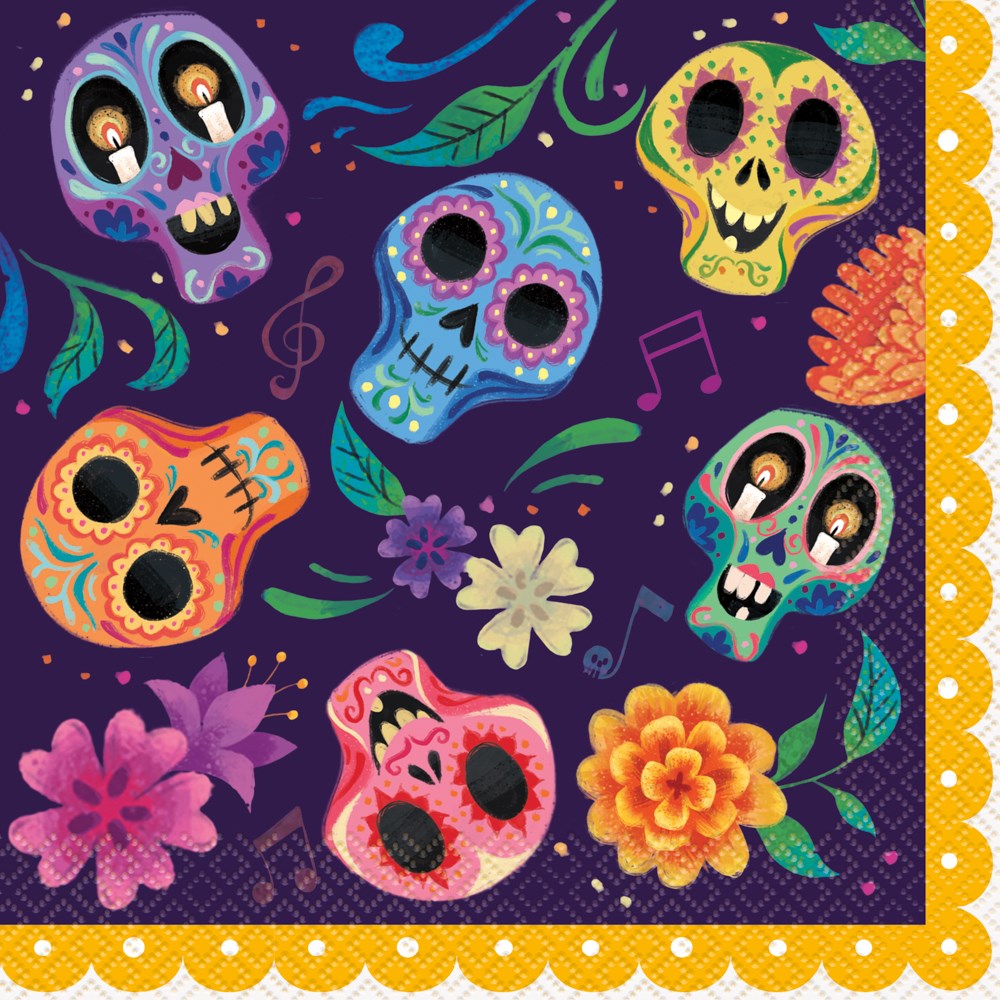 Colorful sugar skulls and vibrant flowers on dark purple napkin with yellow scalloped border.