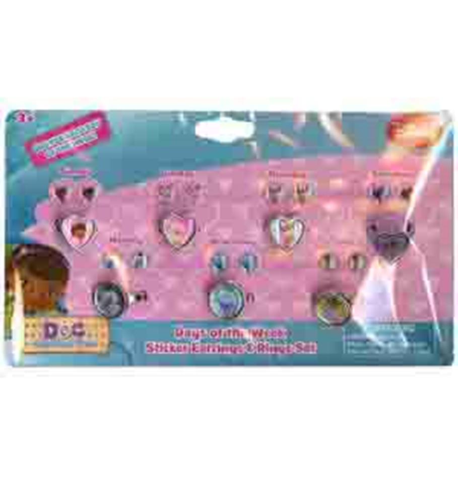 Pink plastic earring holder shaped like a doctor's vest with colorful Doc McStuffins-themed stud earrings displayed on it.
