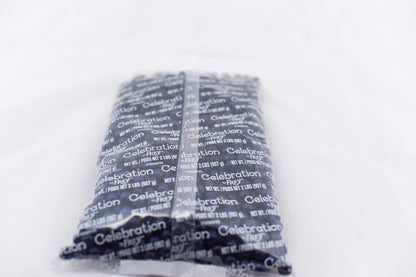 Clear plastic bag filled with small navy blue silica gel packets printed with "Celebration" in white text.