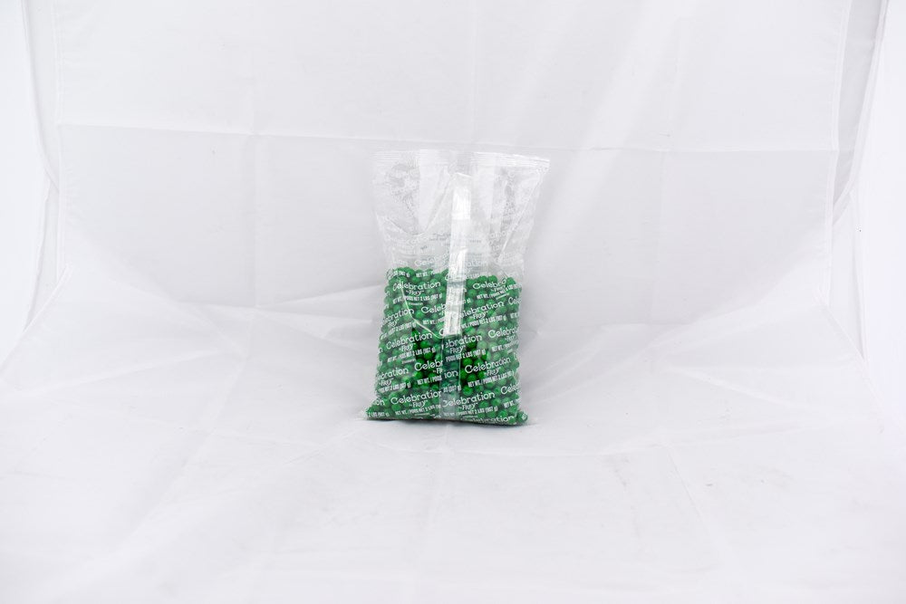 Clear plastic bag filled with small dark green round pellets labeled SiXLets, weighing 2 pounds.