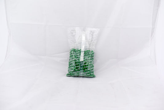 Clear plastic bag filled with small dark green round pellets labeled SiXLets, weighing 2 pounds.