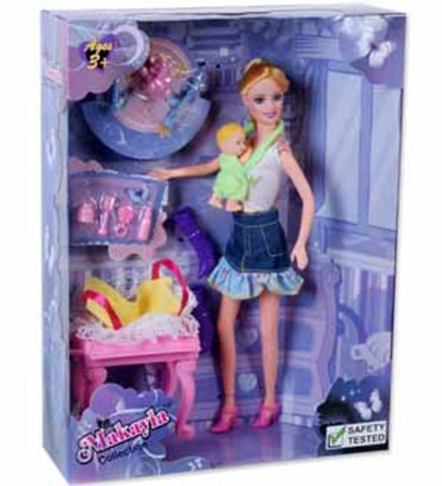 Doll wearing denim skirt and pink shoes holding baby doll, with pink baby crib and accessories in lavender-themed packaging.