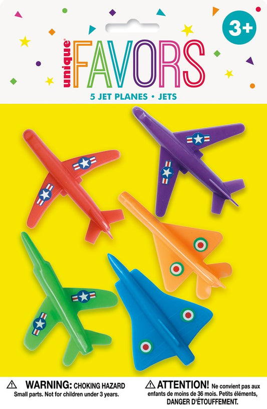 Five colorful plastic jet plane toys in red, purple, green, orange, and blue with star and circle decals, packaged for.