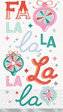 Christmas napkin with colorful festive "Fa La La La" lettering and ornament illustrations in red, teal, pink, and silver.