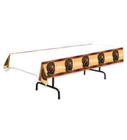 White tablecloth with a border featuring brown roasted turkey illustrations for Thanksgiving.