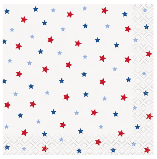 White beverage napkin with scattered red and blue stars and a subtle textured border pattern.