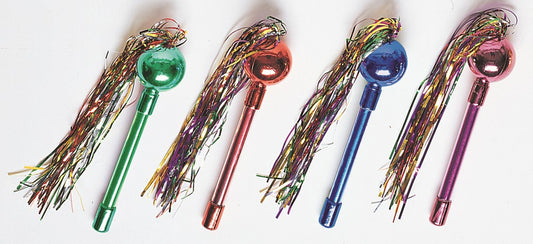 Set of four metallic maracas with long handles in green, red, blue, and purple, each decorated with multicolored tinsel.