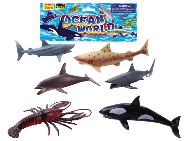 Set of six colorful plastic ocean animal toys including orca, sharks, and lobster with Ocean World packaging.