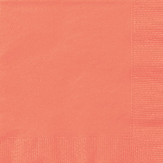Stack of small coral-colored paper napkins with embossed border design.
