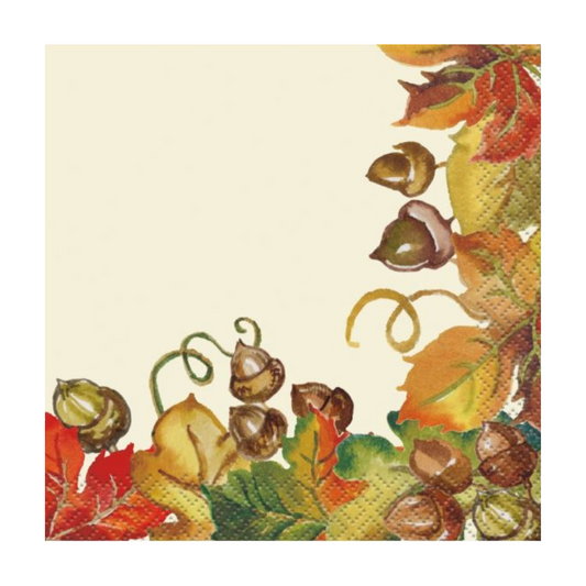 Square beige napkin with colorful autumn leaves, acorns, and curly vines design on edges.