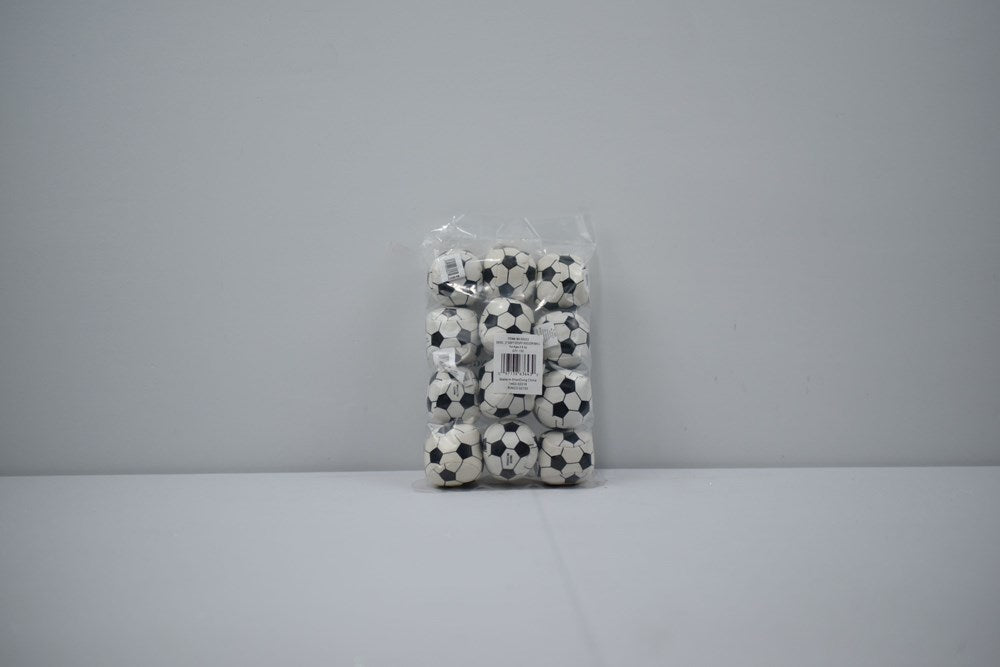 Clear plastic bag containing 12 small black and white classic soccer balls against gray background.