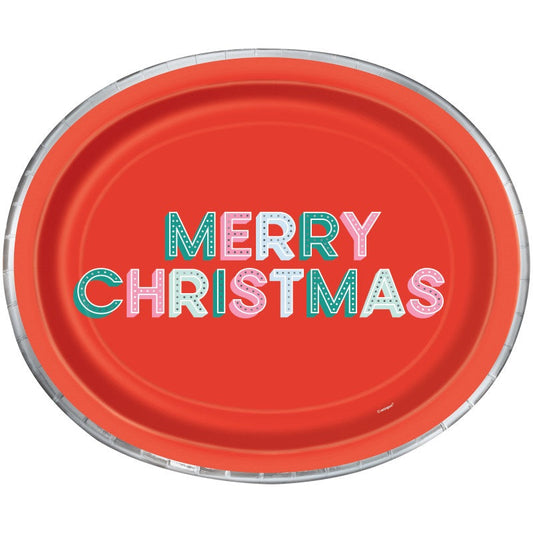 Red oval disposable plate with colorful "Merry Christmas" text in mixed patterns and silver trim.