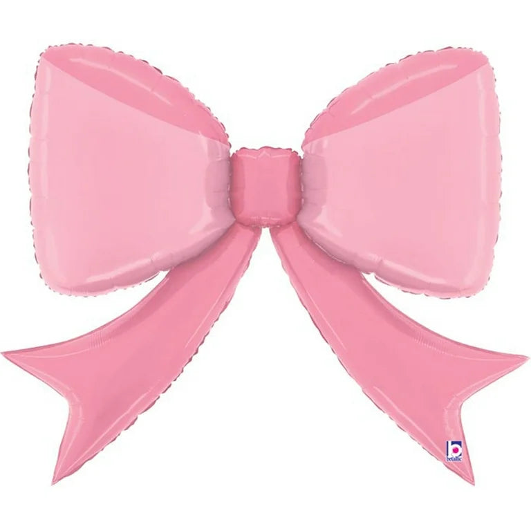 Large pink foil balloon shaped like a decorative bow with two tails and a glossy finish.