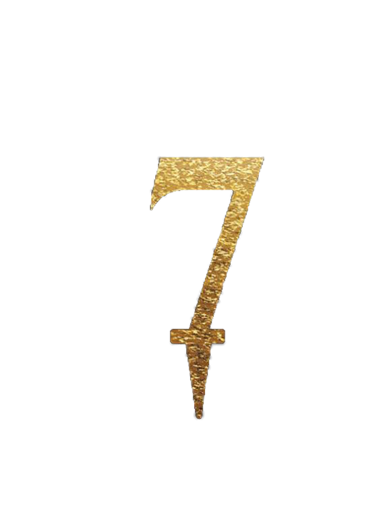 Gold mirror acrylic cake topper shaped as the number 7 with a pointed stake for inserting into cake.