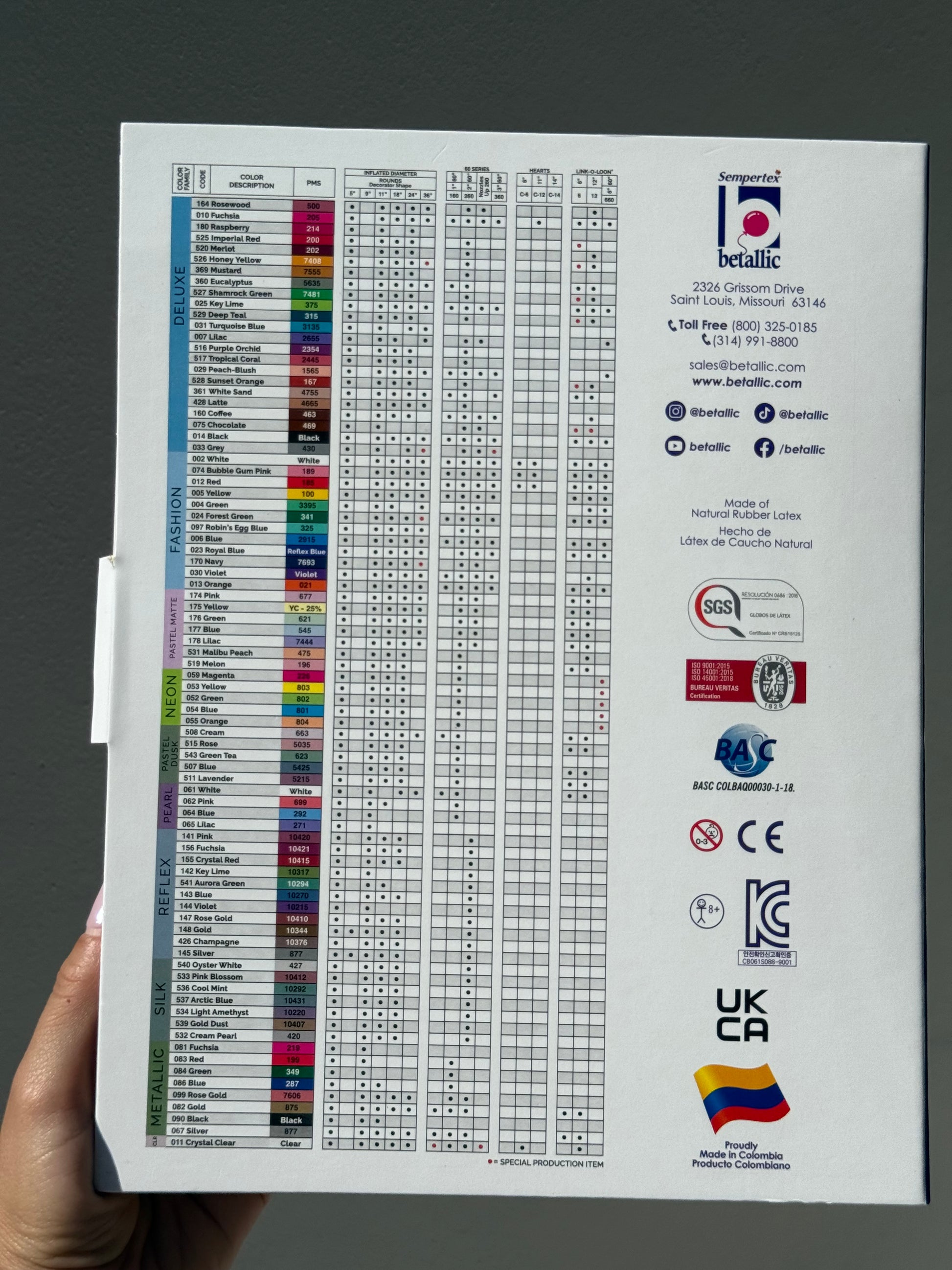 Glossy color chart with vertical columns of 50 vibrant balloon colors and corresponding codes on white sturdy paper.