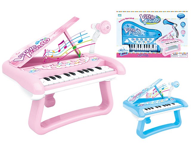 Pink and blue children's keyboard play set with microphone and music notes decoration.