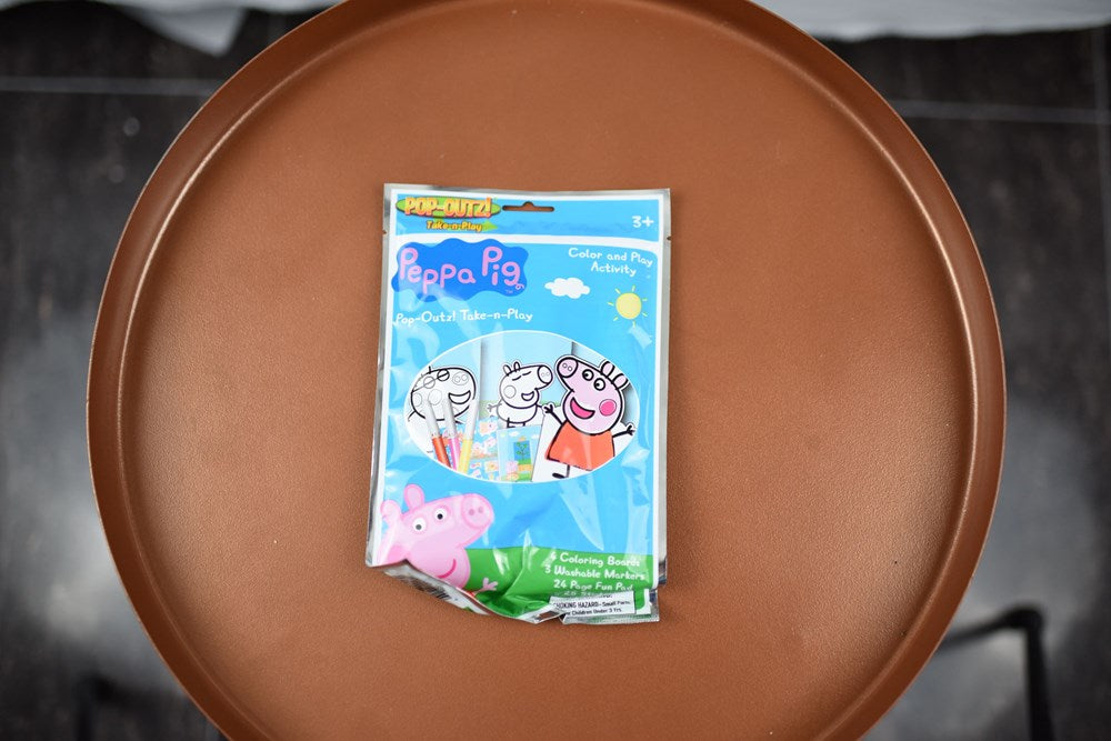 Peppa Pig Take N Play bag with cartoon animal characters on blue background.