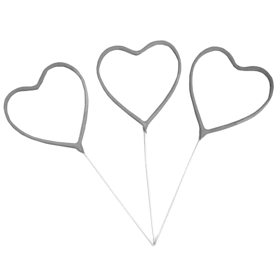 Set of three silver heart-shaped sparklers with thin metal stems.