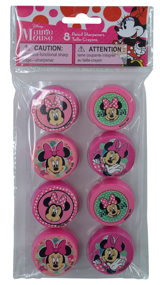 Pack of eight round pink pencil sharpeners featuring Minnie Mouse faces with various expressions and bows.