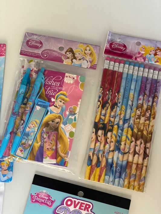 Pink and blue Disney princess-themed stationery set with pencils, eraser, and ruler.