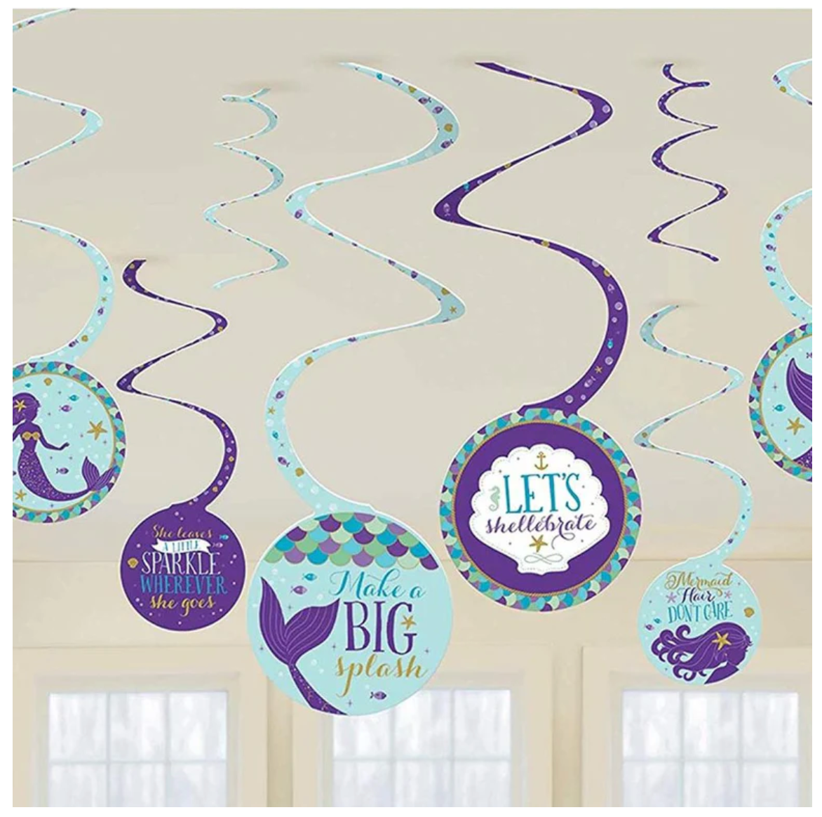 Purple and blue spiral decorations with mermaid silhouettes and phrases like "Make a big splash" and "Let's shellabrate".