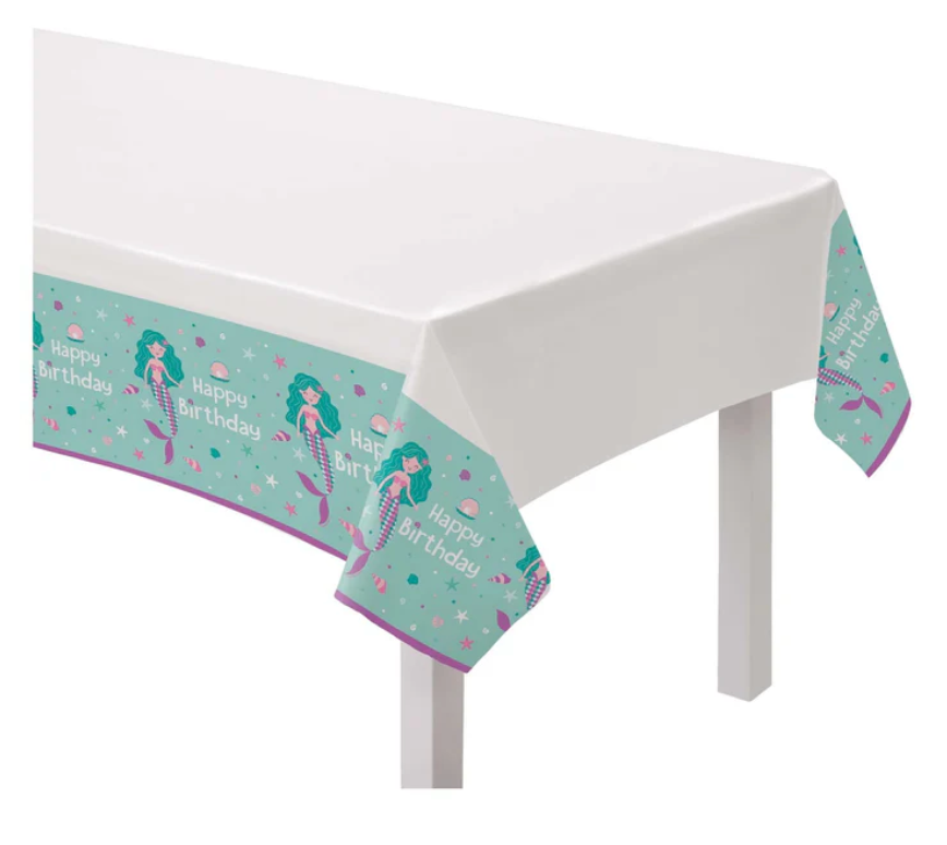 White plastic tablecover with teal mermaid-themed birthday border featuring mermaids, seashells, and "Happy Birthday" text.