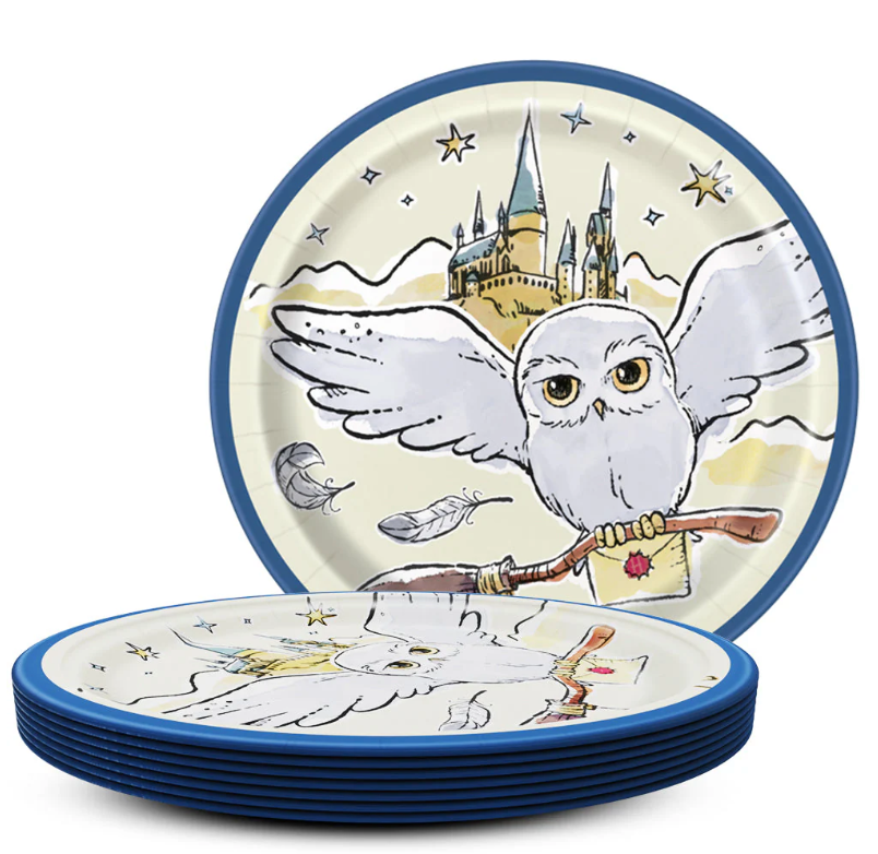 Set of eight 7-inch round plates with blue rims featuring a white owl carrying a letter in front of a castle and stars.