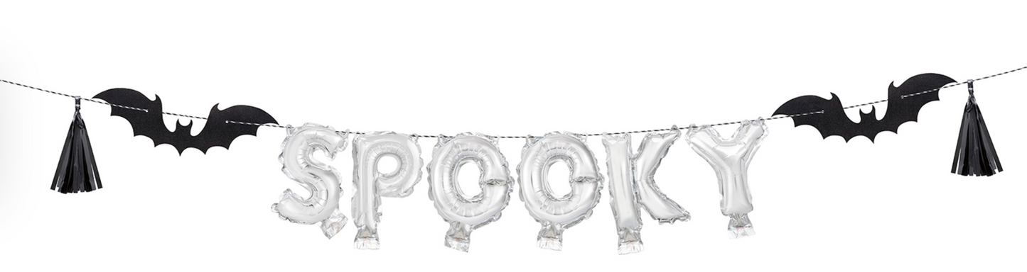 Black bat and tassel balloon banner with silver foil letter balloons spelling "SPOOKY".