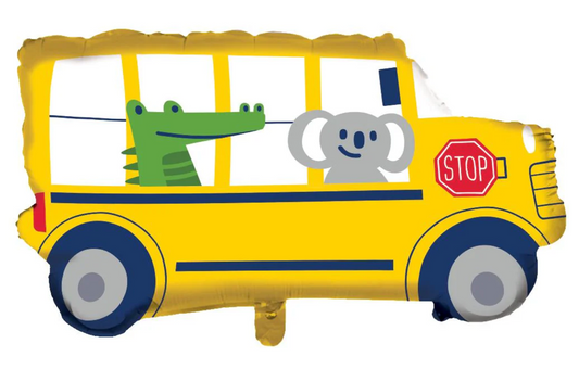 Yellow school bus-shaped metallic balloon with cartoon crocodile and elephant passengers and a red stop sign.
