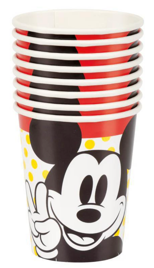 Stack of eight white disposable cups featuring a large black and white Mickey Mouse face with red and yellow polka dot.