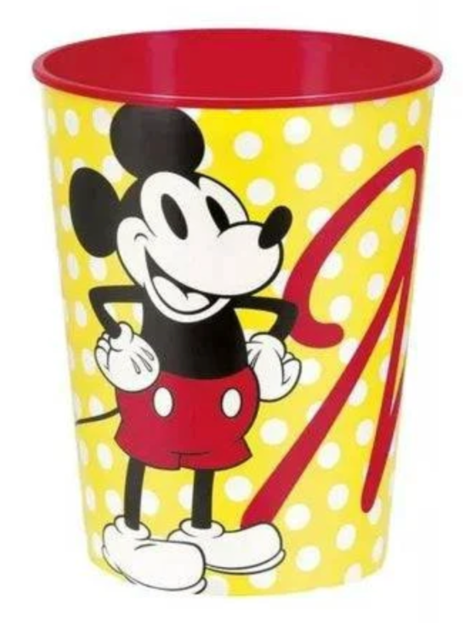 Yellow cup with white polka dots featuring classic Mickey Mouse in red shorts, red interior, 16-ounce capacity.