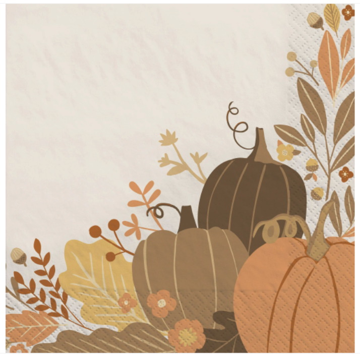 Linen-textured napkin with autumn leaves and pumpkins in gold, brown, and orange tones.