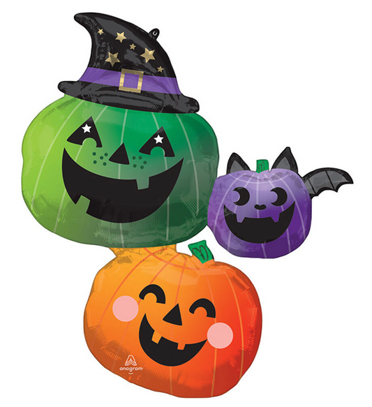 Green with a witch hat, smiling purple with bat wings, and happy orange.